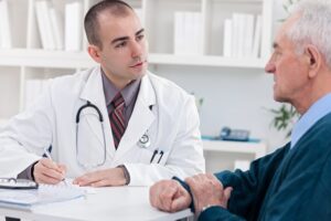 Doctor talking to older man